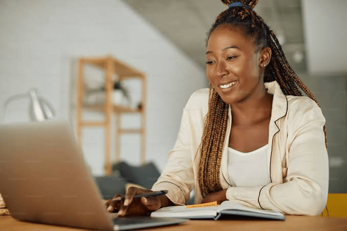 Student smiling while studying